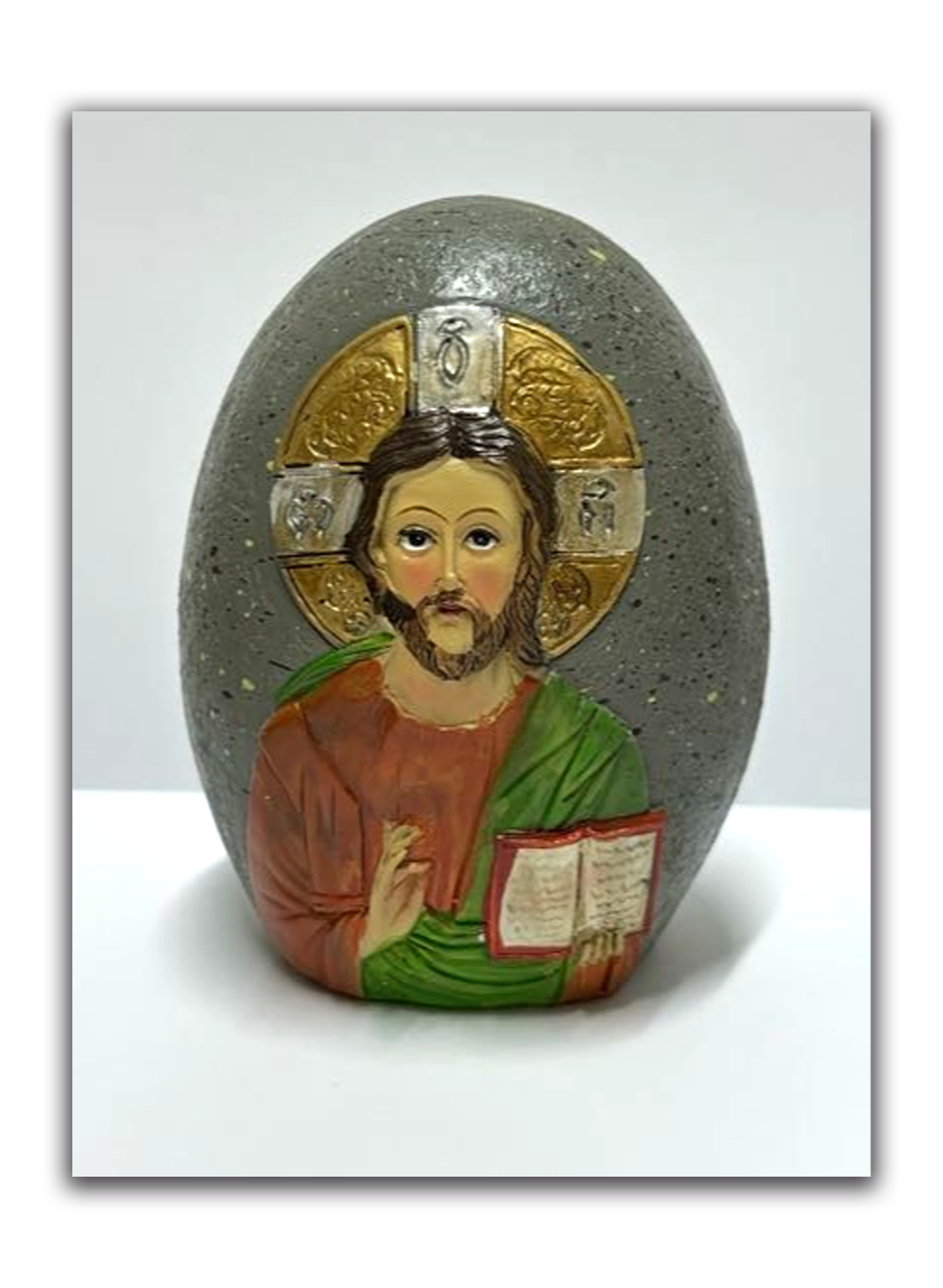 Pedra decorativa com ícone de Jesus Mestre